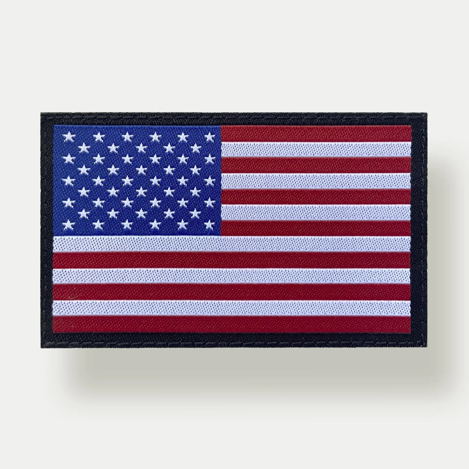 Toppa con bandiera americana colorata 8 x 5 cm